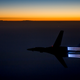 Image for article titled Refueling A Beat To Shit B-1 By Day And A Gorgeous F-22 By Night
